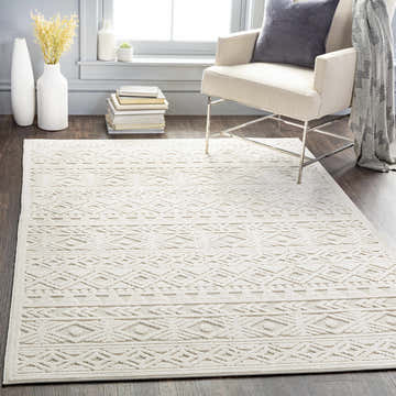 Living room scene with light beige Treuddyn 3D Outdoor Area Rug, chair, and wood floors. Bohemian style. Roomscene-Rectangle