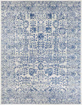 Close-up of the Truxton Area Rug, a light beige rug with a traditional navy floral pattern. Design-Rectangle-710103