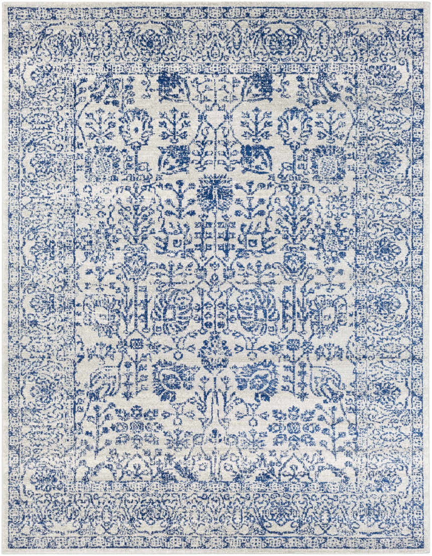 Close-up of the Truxton Area Rug, a light beige rug with a traditional navy floral pattern. Design-Rectangle-710103