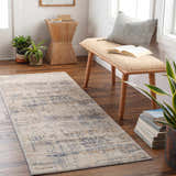Entryway with a Tut Textured Luxe Rug runner in charcoal and ivory, bench, plants, and wood accents. Roomscene-Runner