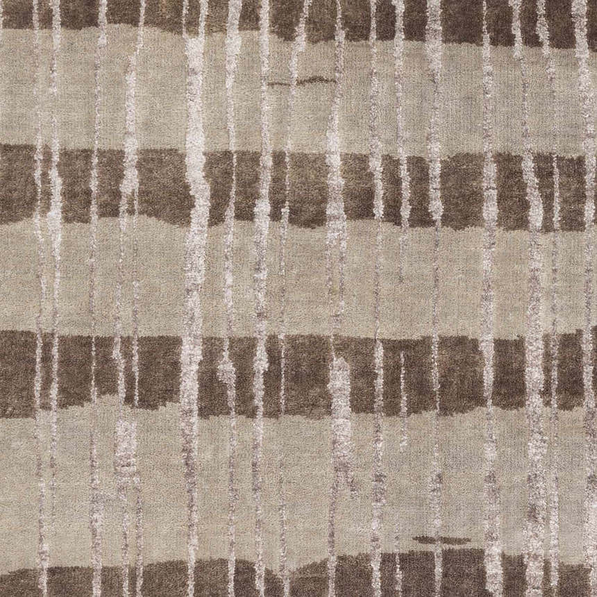 Close-up of the Turbeville Premium Area Carpet. Dark brown, light beige, and taupe stripes with textured detail. Swatch