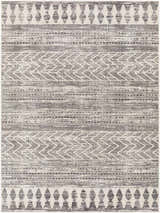 Close-up of the Tuy Area Rug. Bohemian style rug with dark gray, light gray, and nutmeg geometric patterns. Design-Rectangle-537