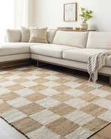 Living room with a neutral sectional sofa and the Tyhir Checkered Jute Rug in light brown and cream. Roomscene-Rectangle
