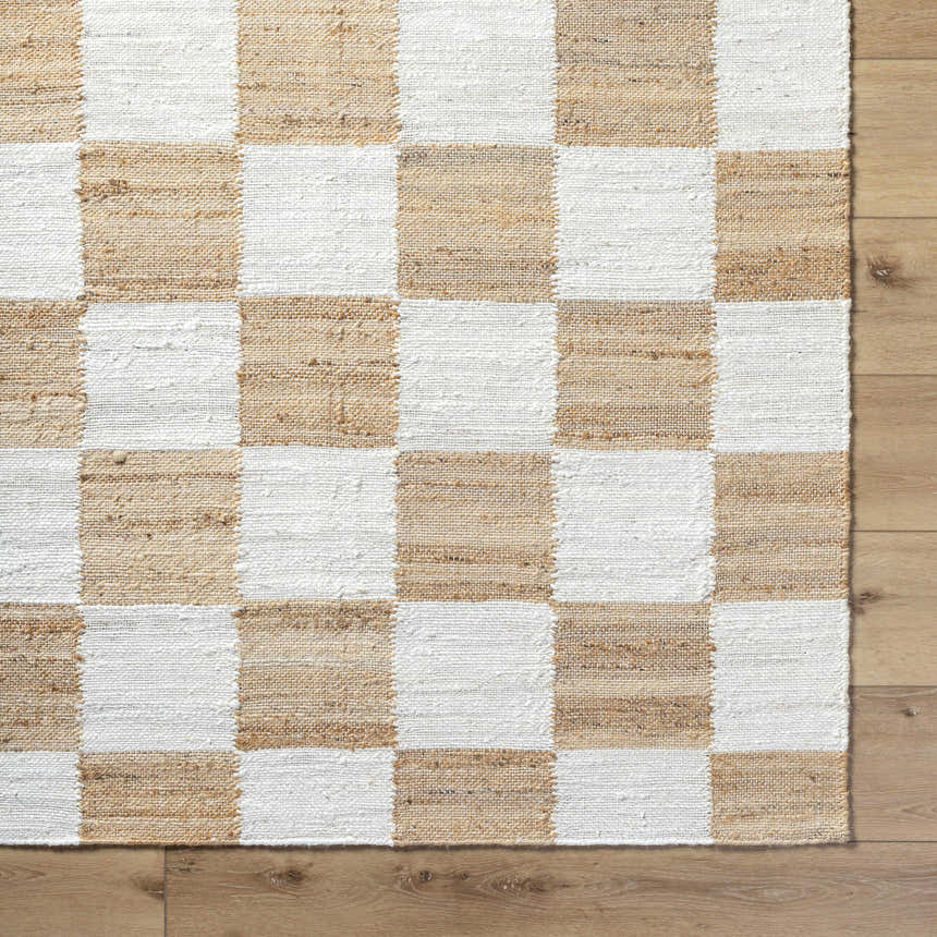 Close-up of the hand woven Tyhir Checkered Jute Rug. Light brown and light slate jute squares create a farmhouse checkerboard pattern. Swatch