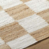 Close-up of the hand woven Tyhir Checkered Jute Rug. Light brown and light slate jute create a farmhouse checkered pattern. Texture