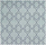 Close-up of Ursa Area Rug in pale blue and navy. Geometric trellis pattern. Machine woven olefin rug. Design-Square-73