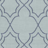 Close-up of the Ursa Area Rug. Navy trellis pattern on a pale blue, textured olefin rug. Swatch