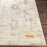 Close-up of the Eversley Area Rug. Cream rug with dark blue, pink, mustard, and sage abstract pattern. Front