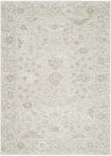Close-up of the Vaman Luxe Rug. Light silver and sterling gray traditional floral pattern. Machine woven polyester rug. Design-Rectangle-279