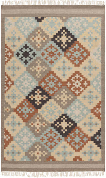 Close-up of the hand-woven Waddy Area Rug. Features a geometric diamond pattern in beige, brown, gray, and blue hues with fringe. Design-Rectangle-58