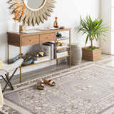 Styled room featuring the Walden Area Rug, a gray rectangle rug with a traditional pattern and yellow accents. Roomscene-Rectangle