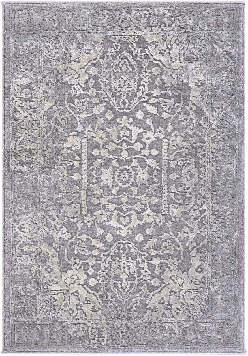Close-up of the Watford Updated Traditional Tibetan Rug, featuring a vintage charcoal and ivory floral pattern. Design-Rectangle-23