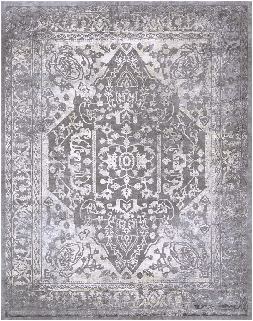 Close-up of the Watford Updated Traditional Tibetan Rug. Charcoal, gray, and ivory floral pattern with vintage distressed texture. Design-Rectangle-710103