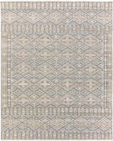 Close-up of the hand-knotted Woodsfield Premium Rug. Features a geometric diamond pattern in beige, brown, and gray wool. Design-Rectangle-810
