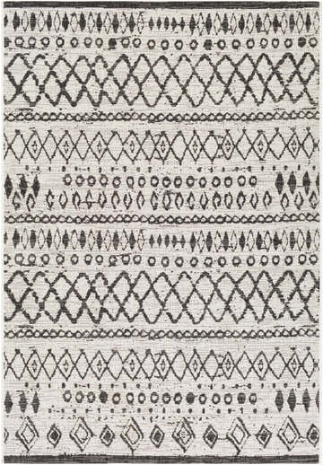 Close-up of the black and white Westside Outdoor Area Rug, featuring a bohemian-inspired geometric pattern. Design-Rectangle-5376