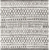 Close-up of the Westside Outdoor Area Rug. Black and white rug with a bohemian geometric pattern. Machine woven polypropylene texture. Design-Square-67