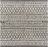 Close-up of the Westside Outdoor Area Rug. Black and white geometric pattern with bohemian and southwestern style. Design-Square-710