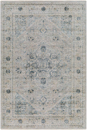 Close-up of the Whangamata Thick Luxe Boutique Rug. Features a traditional design in dusty sage, light gray, and pale blue tones. Design-Rectangle-575