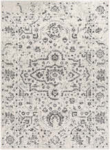 Close-up of the Willowbrook Area Rug. Charcoal and gray vintage-style oriental rug with a light beige background. Design-Rectangle-5373