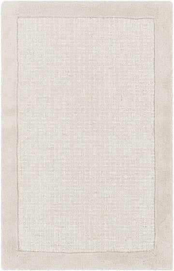 Close-up of the Winooski Area Rug. Cream and light gray wool rug with a subtle striped pattern and soft, textured pile. Design-Rectangle-23