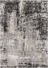 Close-up of the Witchford Abstract Charcoal Thick Rug. Features black, gray, ivory, and tan colors with an abstract pattern. Design-Rectangle-5373