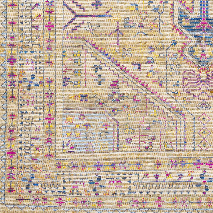 Close-up of Wallburg rug. Hand woven jute rug with light blue, purple, tan, white, and yellow bohemian design. Swatch