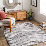 Living room scene with a Walloon Gray Marble Thick Rug, wood furniture, and neutral tones. Roomscene-Rectangle