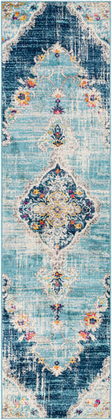 Close-up of the Wallsburg Blue Area Rug, showcasing its traditional, bohemian pattern and colors like navy, orange, and blue. Design-Runner-2710