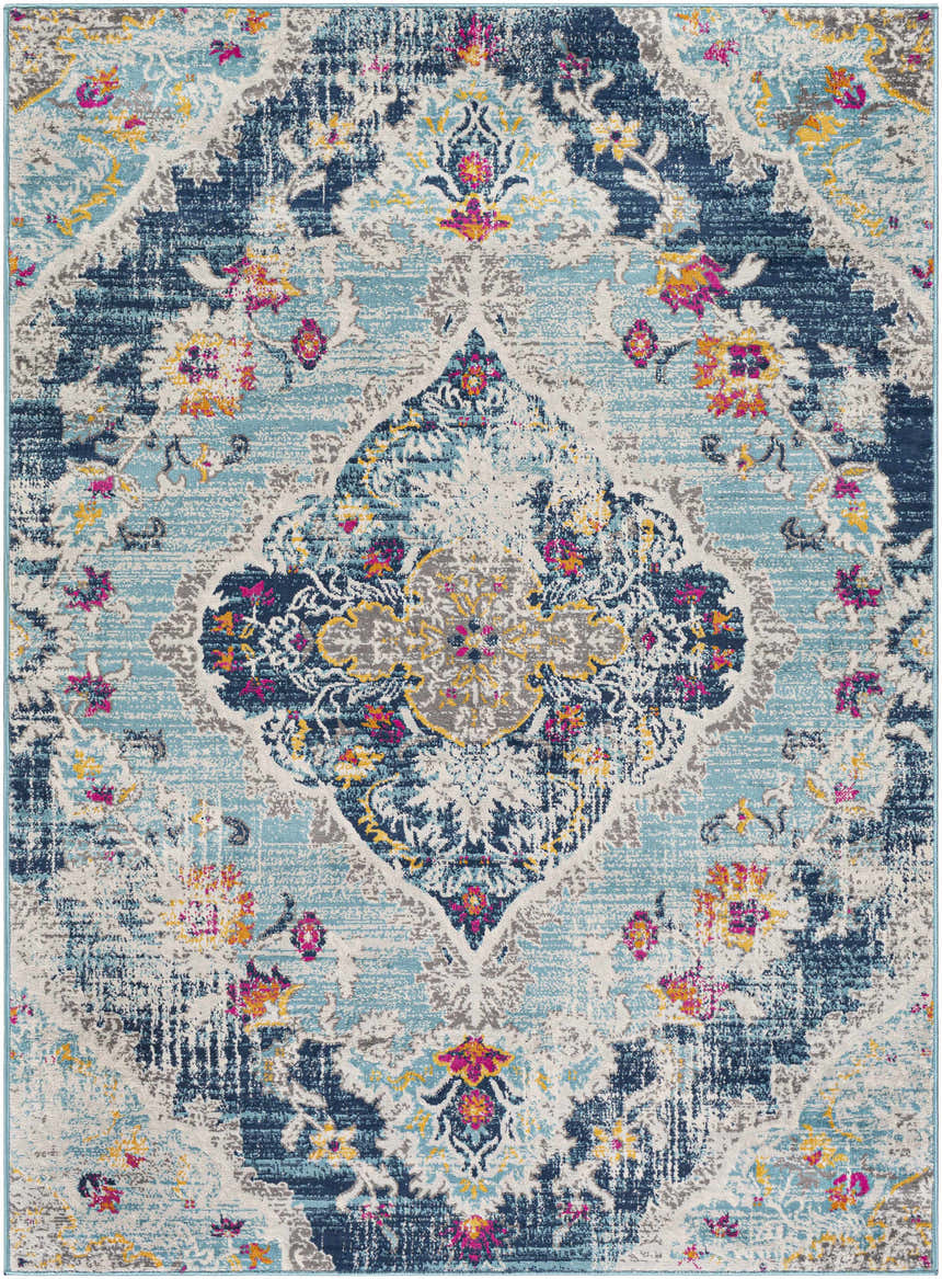 Detailed view of the Wallsburg Blue Area Rug, featuring a traditional floral pattern in blue, orange, fuchsia, and gray. Design-Rectangle-5371
