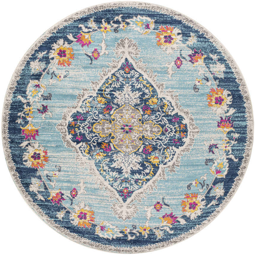 Detailed view of the round Wallsburg Blue Area Rug, featuring a floral pattern in burnt orange, fuchsia, and navy. Design-Round-67