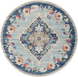 Detailed round Wallsburg Blue Area Rug featuring a floral pattern in burnt orange, fuchsia, and navy on a light blue background. Design-Round-710