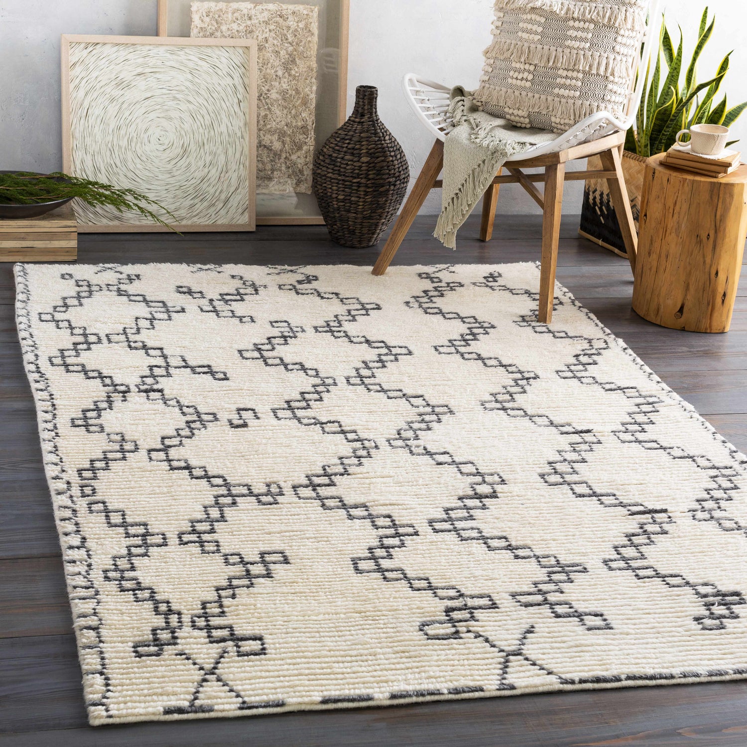 Styled room featuring Wardell Area Carpet. Ivory wool rug with charcoal geometric pattern in a transitional space. Roomscene-Rectangle