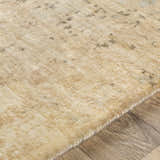 Close up of the hand knotted Waterbeach Premium Carpet showing wool texture and subtle contemporary pattern. Texture