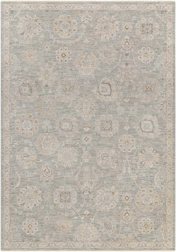 Close-up of the Wurtulla Thick Luxe Statement Rug. Features a vintage floral pattern in denim, dusty sage, beige, and gray tones. Design-Rectangle-6796