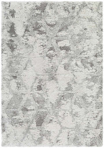 Close-up of the Wynant Gray Tones Plush Rug. Soft, shag texture with light gray, medium gray, and off-white colors. Design-Rectangle-537