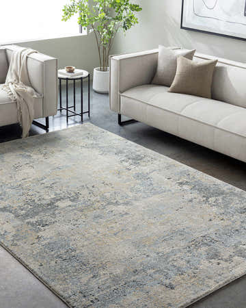 Living room scene with a gray Adamma Thick Luxe Rug, light sofas, and modern decor. Roomscene-Rectangle