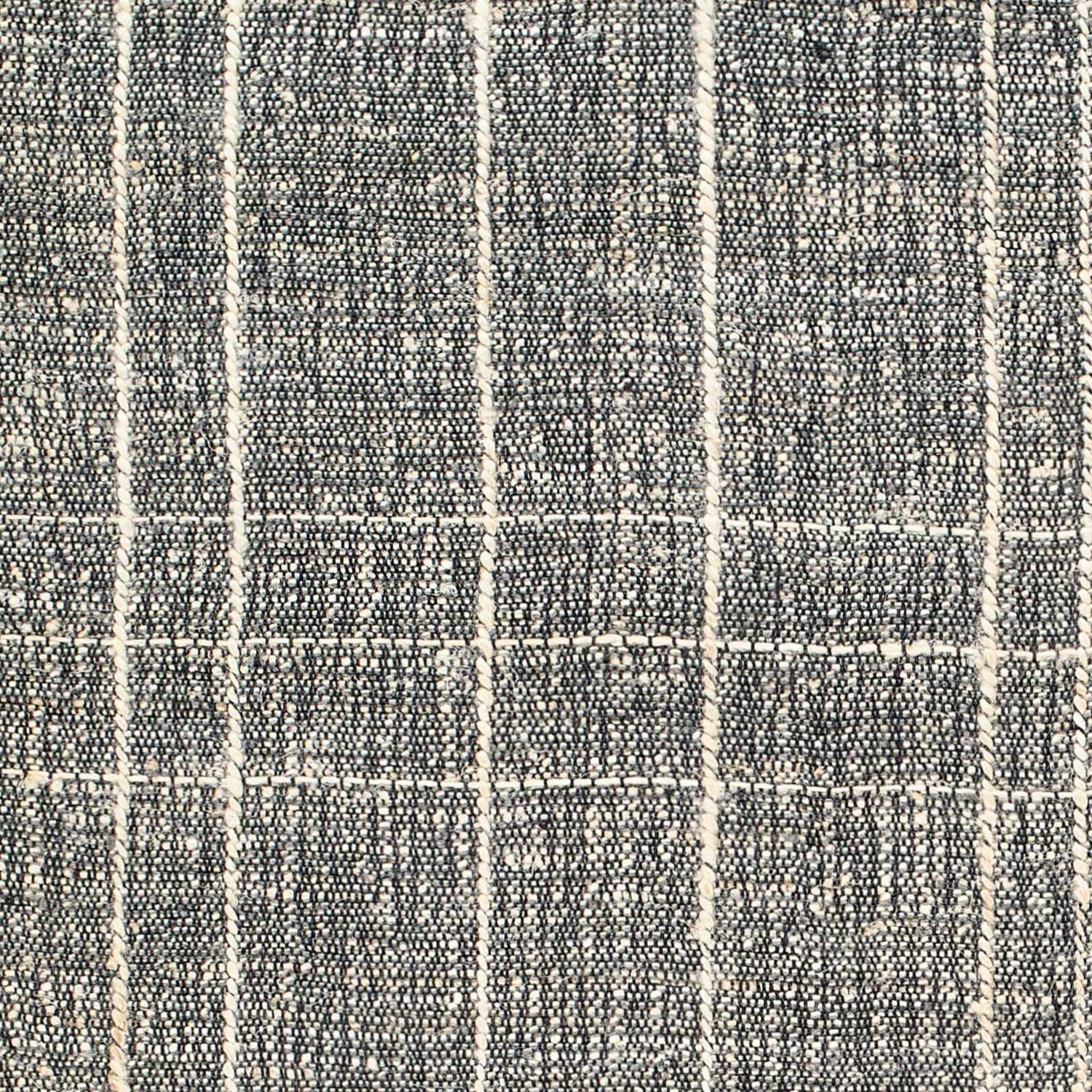 Close-up of the hand woven Yeva Area Rug. Dark gray jute with natural gray stripes create a contemporary plaid pattern. Swatch