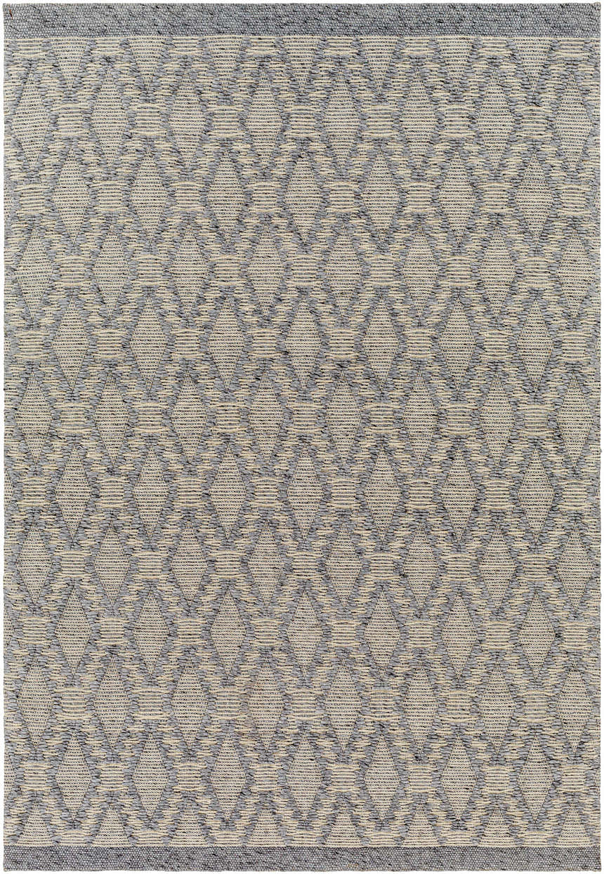 Close-up of the Yank Area Rug, a hand-woven rug with a gray and light brown diamond pattern. Farmhouse style. Design-Rectangle-576