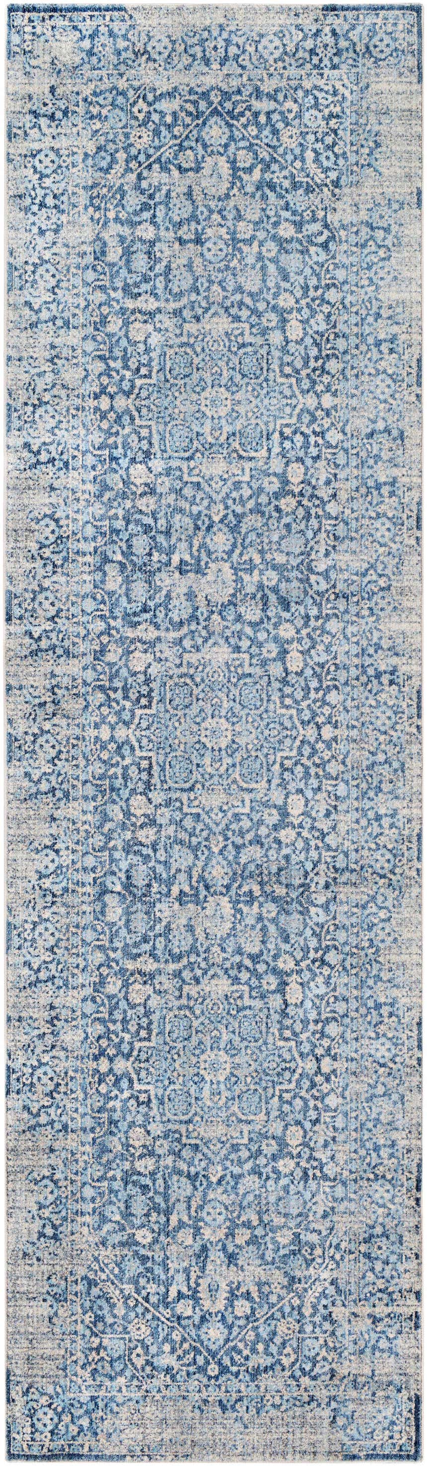 Close-up of a distressed Yorkana Blue Rug, featuring a traditional, vintage-inspired pattern in blue, gray, and beige tones. Design-Runner-279