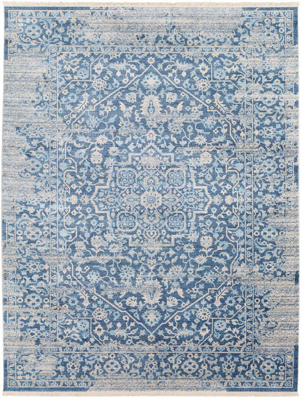 Close-up of the Yorkana Distressed Blue Rug. Features a traditional, vintage-inspired design in blue, gray, and beige tones. Design-Rectangle-710103