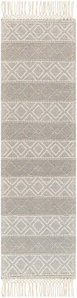 Close-up of the hand woven Zaza Wool Rug with Tassels in bone and cloud gray geometric pattern. Farmhouse style. Design-Runner-2376