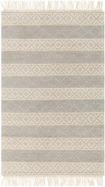 Close-up of Zaza Wool Rug in bone and cloud gray. Hand-woven rug with geometric pattern and tassels. Design-Rectangle-58