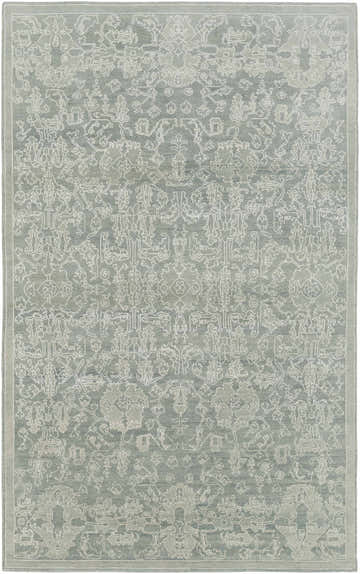 Close-up of the hand-knotted Zillah Area Carpet. Farmhouse style rug in muted green with a traditional floral pattern. Design-Rectangle
