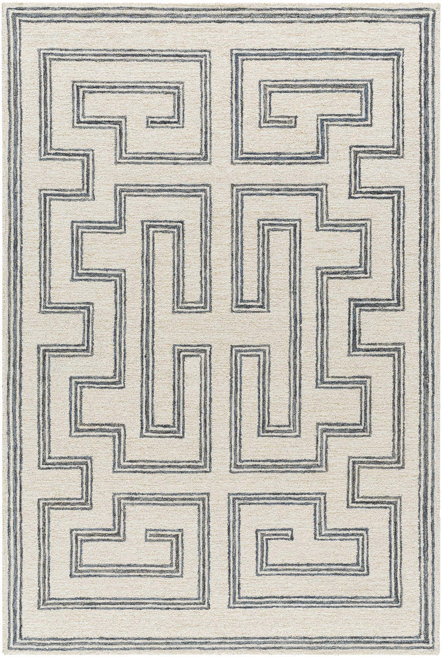 Close-up of the hand-tufted Zhang Area Rug. Gray and silver geometric Greek key pattern on a light silver wool rug. Design-Rectangle-576
