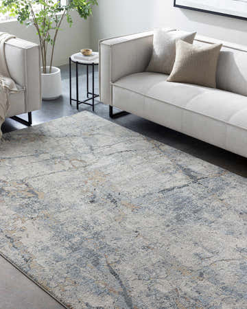 Living room scene with a Urowo Blue Thick Luxe Rug, beige sofa, and neutral pillows. Modern, airy feel. Roomscene-Rectangle