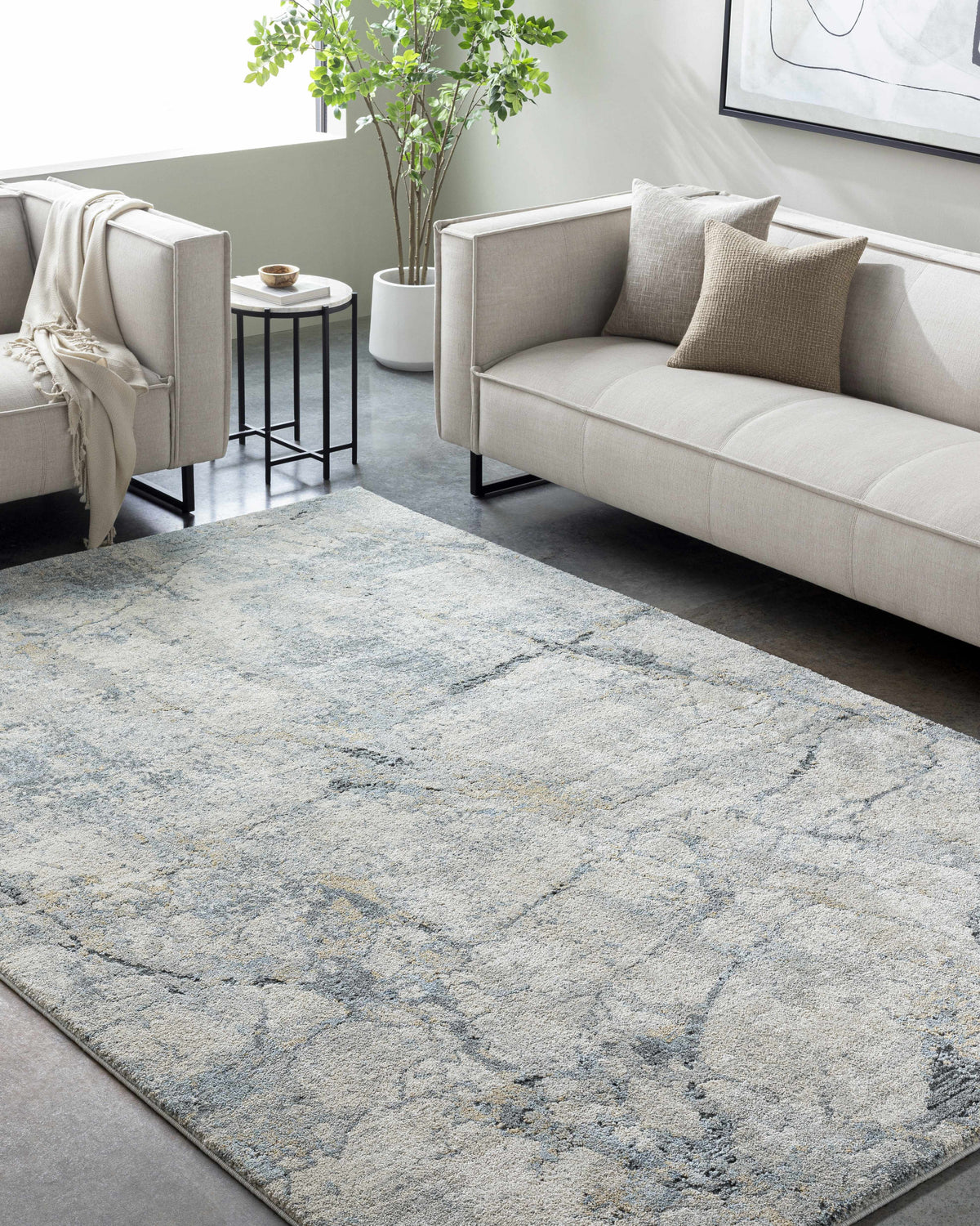 Living room scene with a Urowo Light Gray Thick Luxe Rug, light gray sofas, and a modern aesthetic. Roomscene-Rectangle
