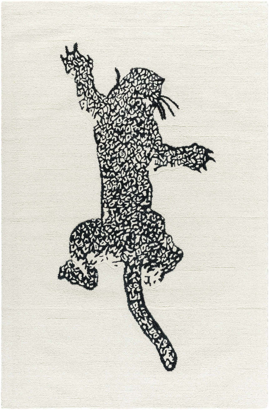 Close-up of the Zosia Area Rug; off-white wool with a black, abstract leaping cat design. Hand-tufted texture. Design-Rectangle-58